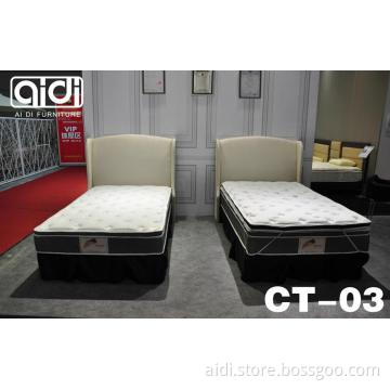 hotel bedroom: mattress,bed,headboad
